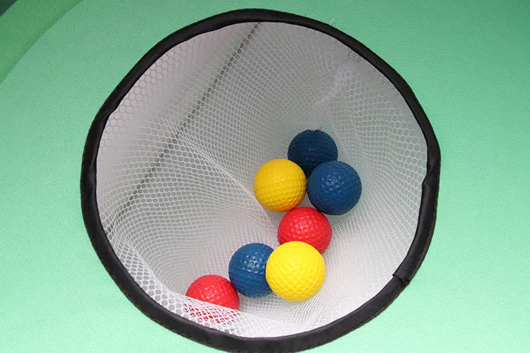 Green 90x60cm golf swing practice net with PVC frame and oxford cloth cover on grass, with straw mat and balls