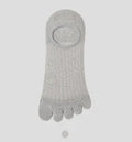 Modal five-finger boat socks in black, shown on a foot with invisible no-show style.