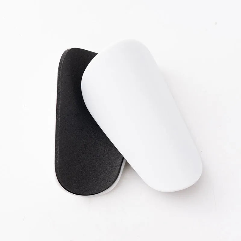 PU mini shin guards for football and sports, shown in black, white, red, and blue colours.