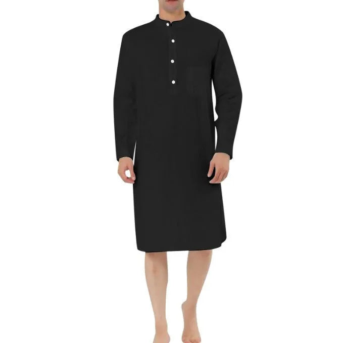 A man's long-sleeve cotton shirt robe in a light blue colour, showing a button front and chest pocket.