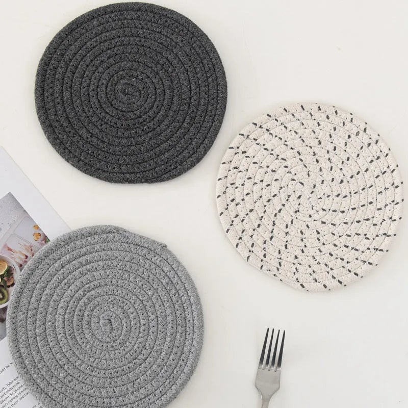 Set of three round cotton cord coasters in blue colour, each measuring 18cm diameter