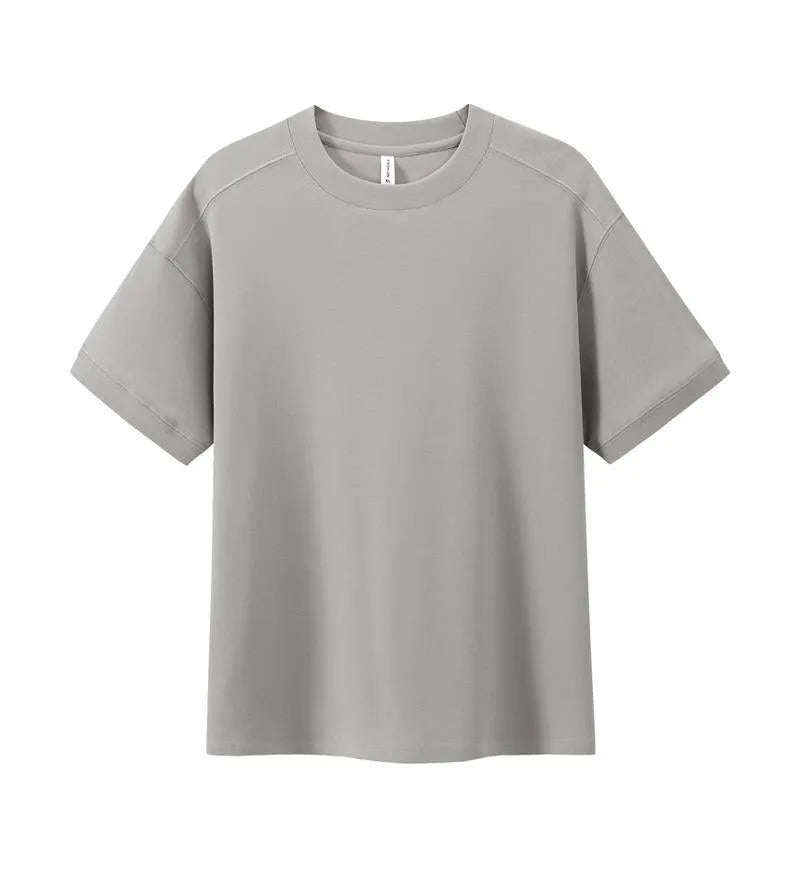 Breathable pique short-sleeved cotton T-shirt in loose fit, solid colour, summer wear