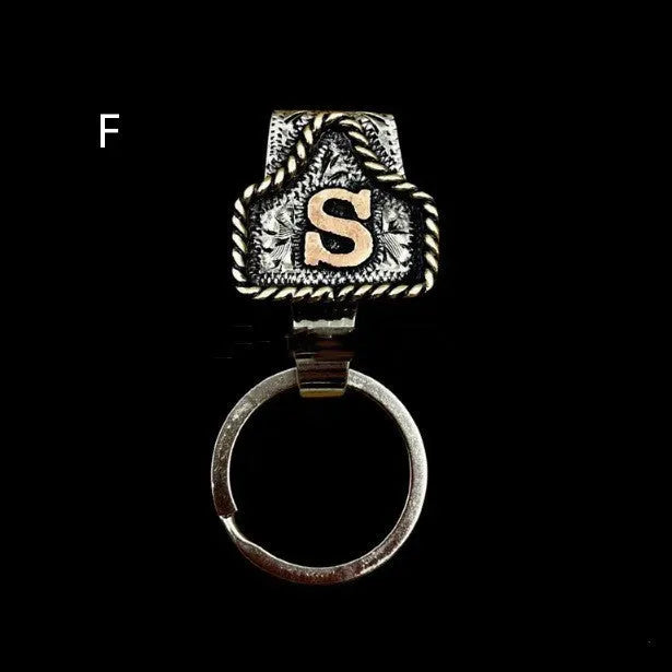 Handmade stainless steel cow tag belt key holder with engraved number plate on a split ring.