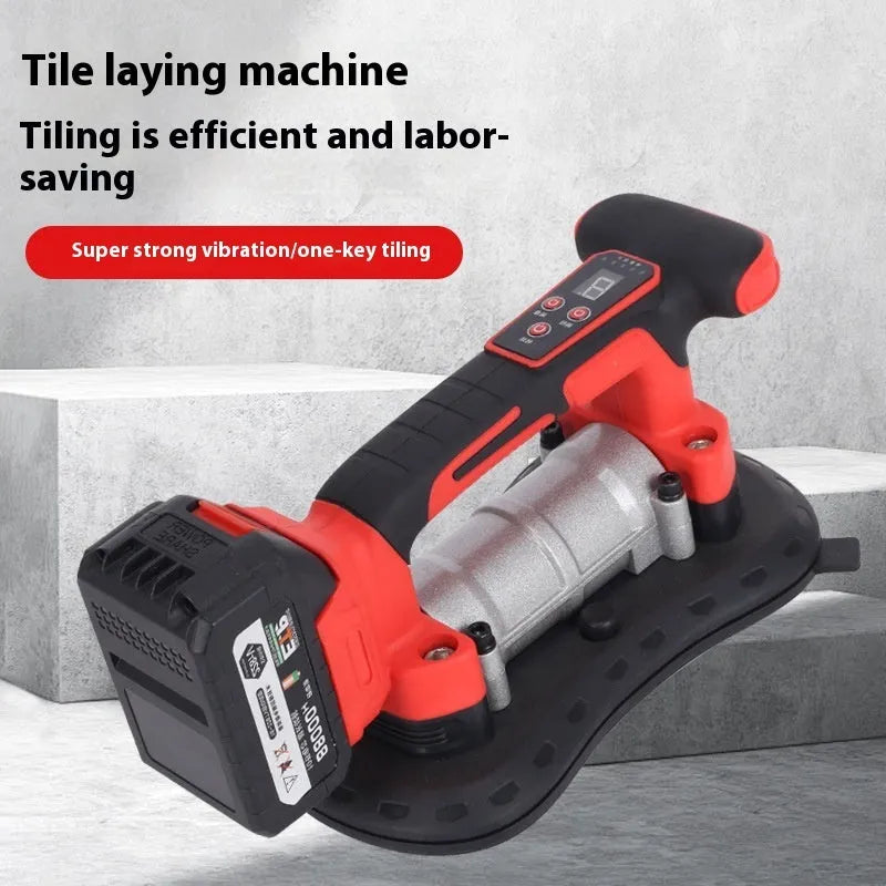 Cordless tile laying machine with digital display showing settings, placed next to ceramic tiles