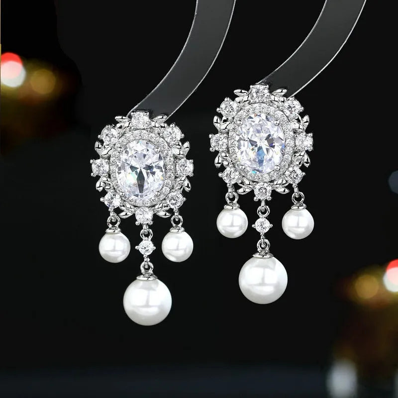 Oval geometric zircon inlaid pearl tassel earrings in light purple, pink, white or light blue colours