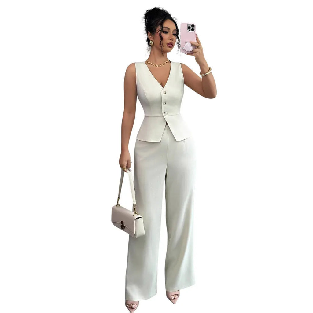 Women's solid colour sleeveless vest and high-waist trouser two-piece set in a casual style.