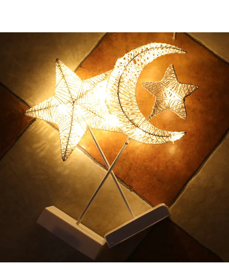 Rattan star-shaped LED lamp with copper wire frame measuring 23x40cm