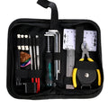 Black guitar repair tool kit open to show plastic and metal maintenance tools for guitar, bass, mandolin, banjo.