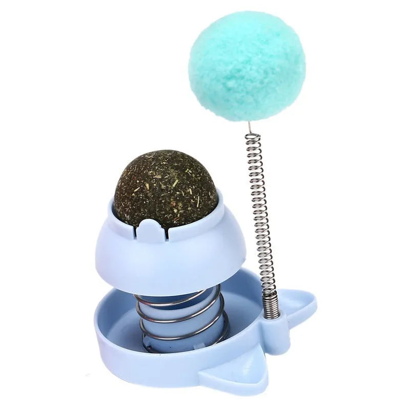 Blue, orange, and pink lucky cat design mint balls for cat dental care and play.