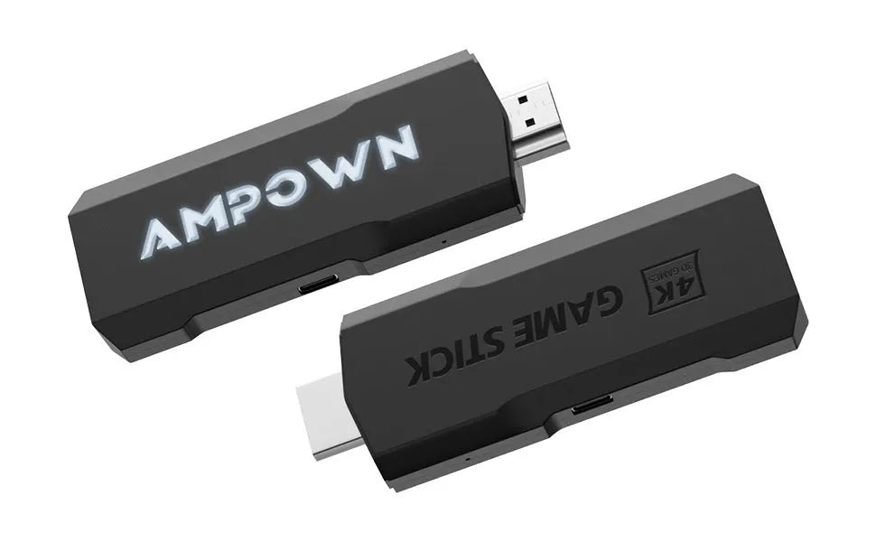 Compact black ABS wireless game console with handle, placed next to HDMI and charging cables on a surface.