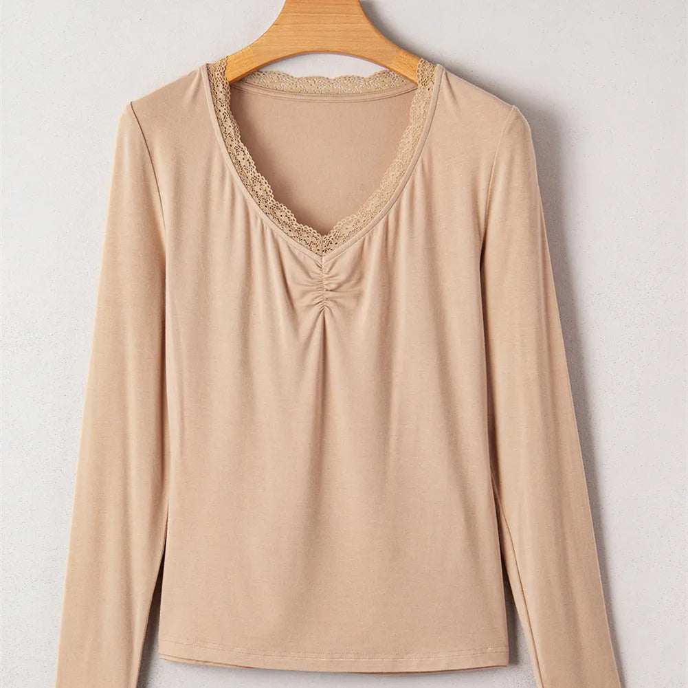 Women's red casual top with lace trim detailing and long sleeves