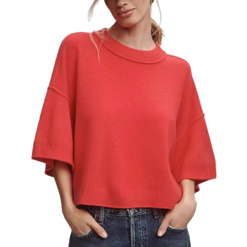 Red hot girl style viscose t-shirt with short sleeves and an exposed navel cut on a mannequin.