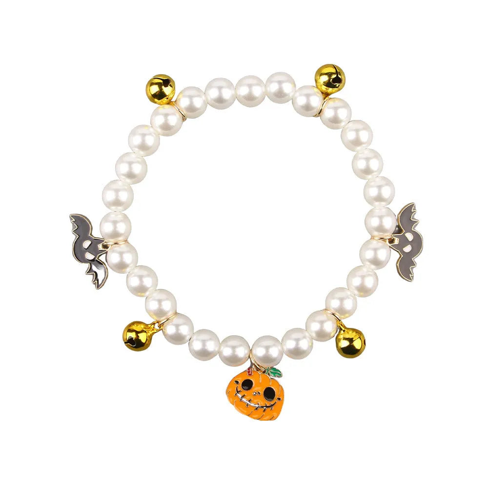 Halloween cat collar decoration with simulated pearl necklace in pumpkin-themed colours
