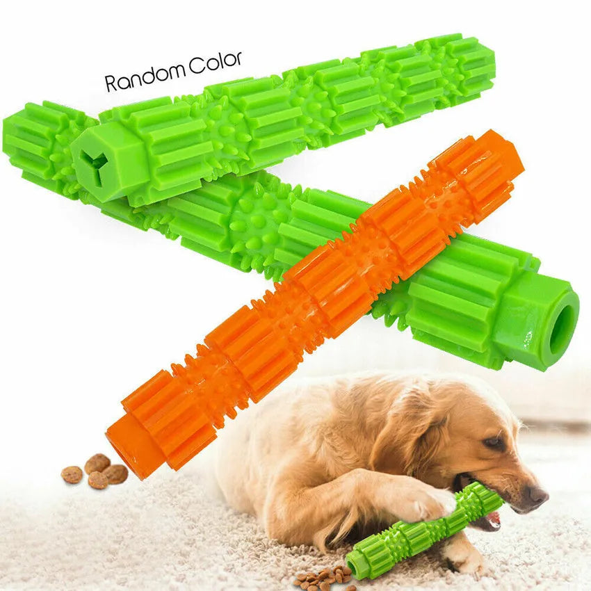 Green and orange rubber dog chew toy with treat dispensing opening and textured teeth cleaning surface