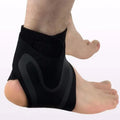 Adjustable ankle support brace for sprain recovery in black for left or right foot sports use