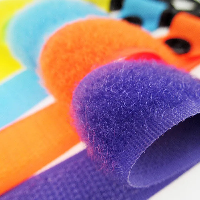 A nylon luggage Velcro hook in one of 18 available colours, shown in independent OPP packaging.