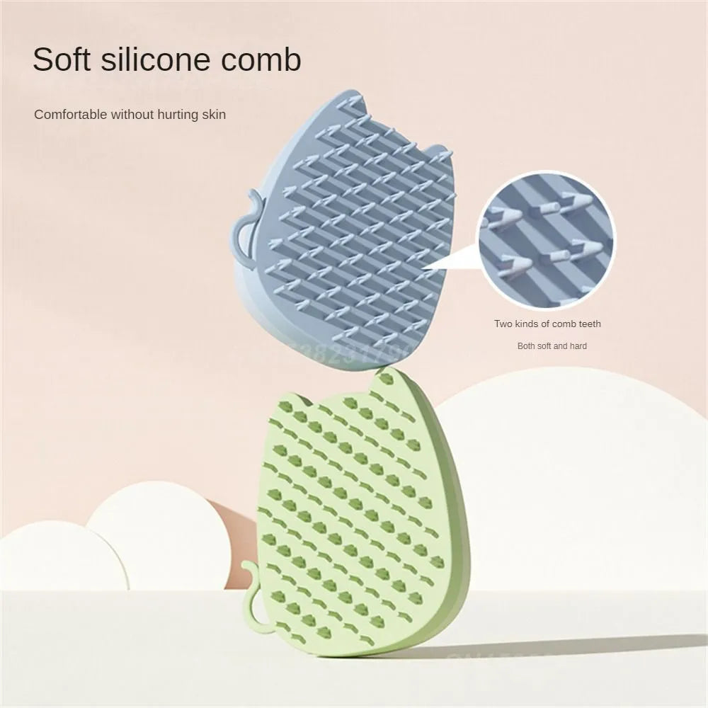 Blue silicone sponge pet grooming brush with two types of comb teeth on a white background.