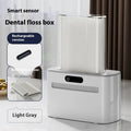 Rechargeable intelligent induction dental floss box in dark gray, light gray, or gold with automatic pop-up mechanism