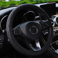 Elastic embossed steering wheel cover for 37-38cm diameter wheels in various colours.