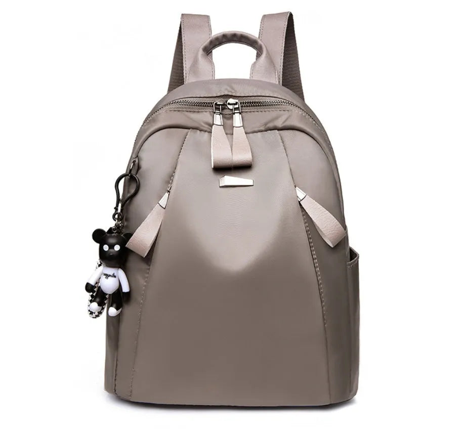 Medium Oxford cloth rucksack with internal phone and ID compartments in wine red colour