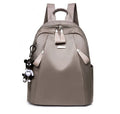 Medium Oxford cloth rucksack with internal phone and ID compartments in wine red colour
