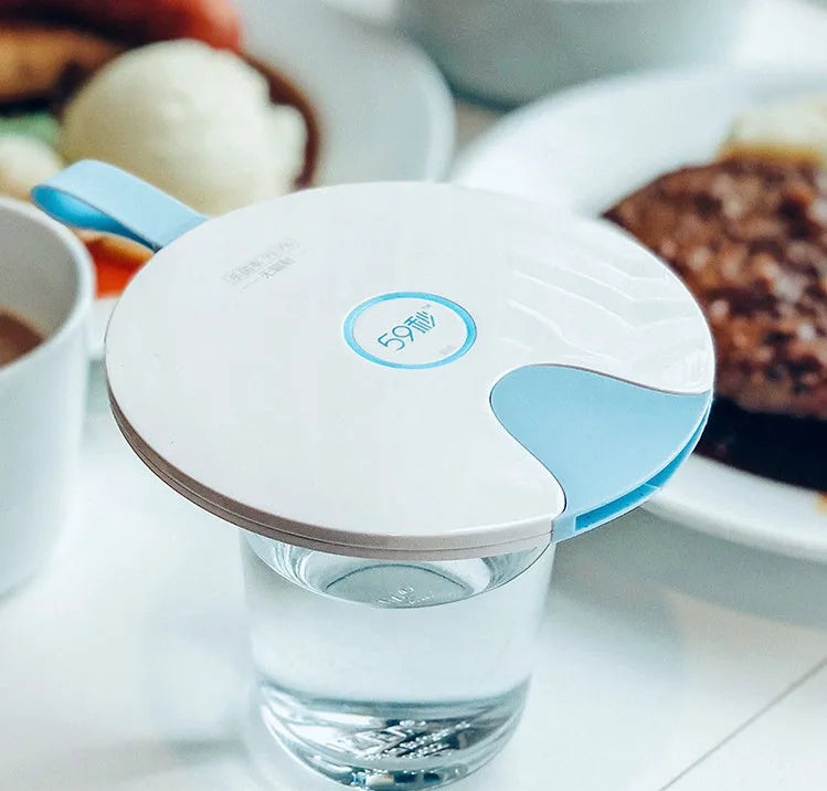 Blue portable baby bottle sterilizer with USB port showing compact 163.6mm design