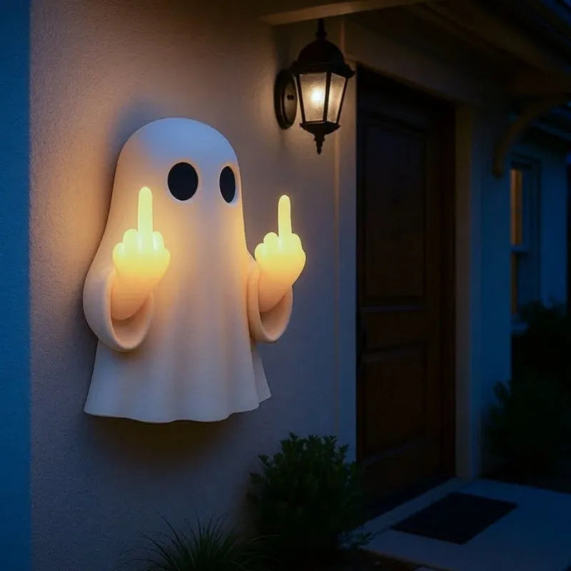 White cute ghost statue night lamp with modern design for Halloween decoration.