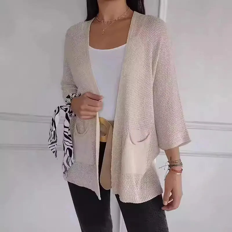 Women's thin waffle knit cardigan coat with nine-quarter sleeves and front pockets in army green.