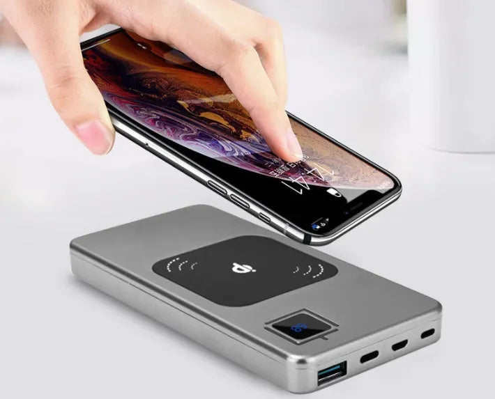 Silver alloy portable power bank with LCD display showing battery level