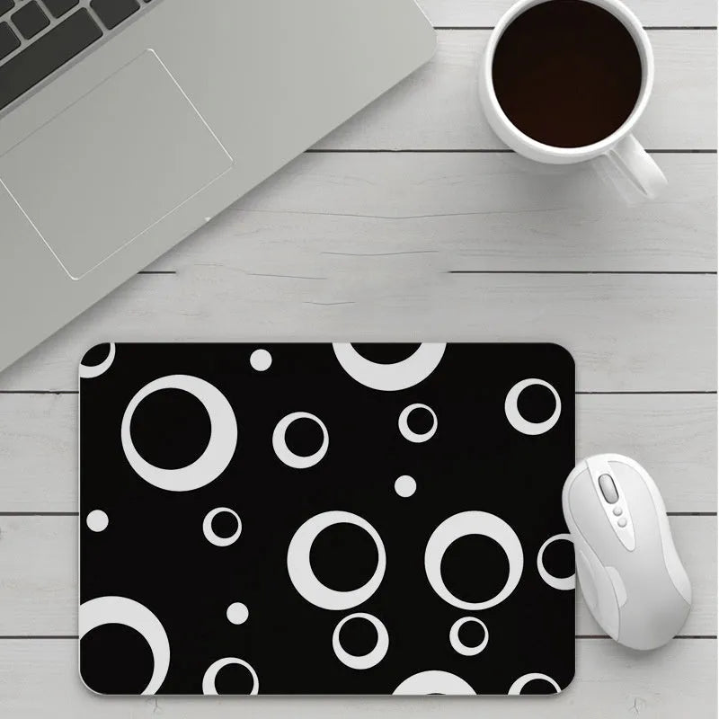 Custom cartoon mouse pad with thickening, showing example artwork on non-slip rubber and cloth base.