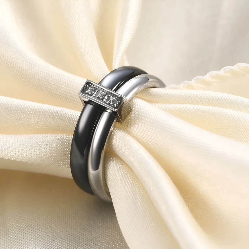 Ceramic women's ring with 6mm zirconium inlay in geometric design, available in steel black or gold white finishes