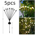 Solar-powered LED garden ground light with multiple light heads and a stainless steel spike for installation.