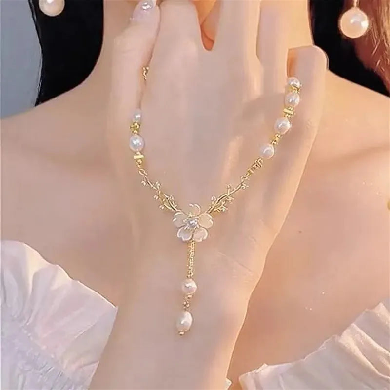 Women's alloy pearl chain necklace with rose and floral design elements in pearl flower colour