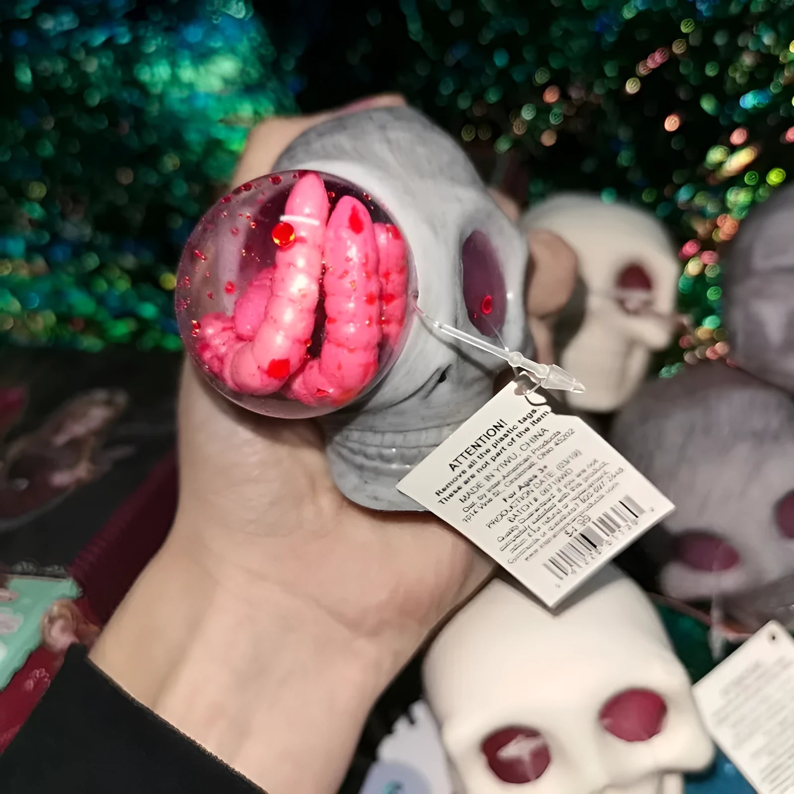 Grey Halloween skeleton pinch decompression ball 8 by 7 cm with popping sound