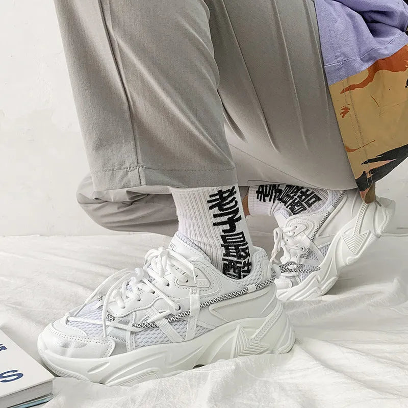 Men's white platform dad shoes with lace-up front, shown on a light background