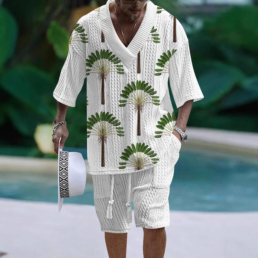 Man wearing a loose fit casual short sleeve top and matching shorts suit set