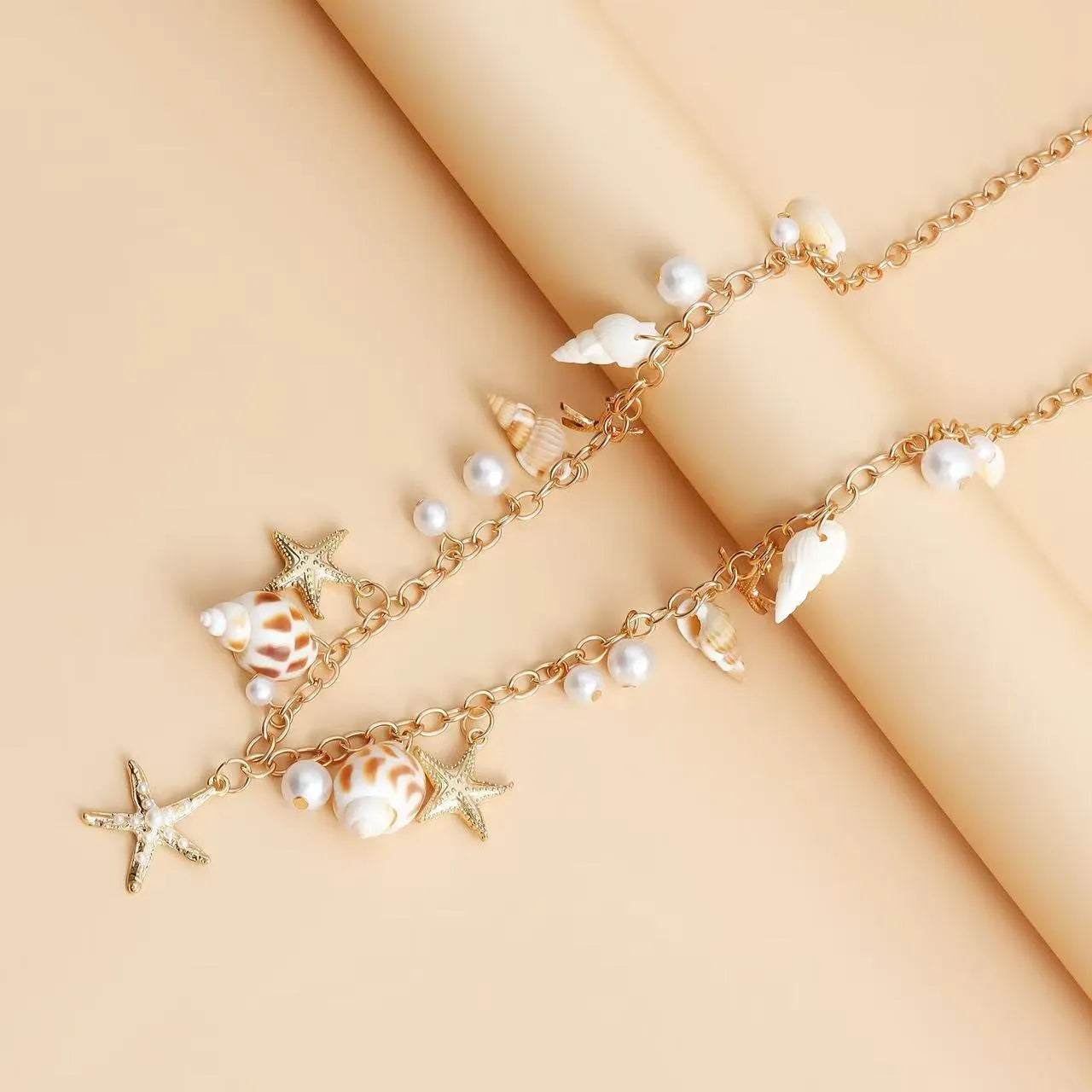 Women's alloy star charm waist chain and matching bracelet set for beach jewellery