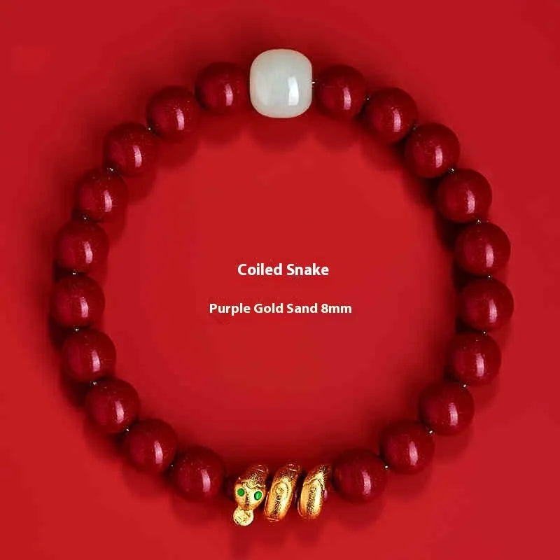 Handmade cinnabar snake year bracelet with Zodiac animal design, showing snake beads in traditional Chinese style.