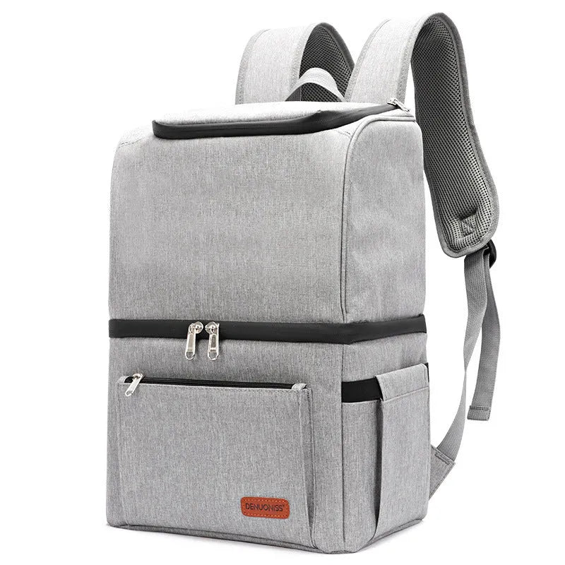 Blue insulated backpack with double-layer construction and refrigerated ice pack compartment open