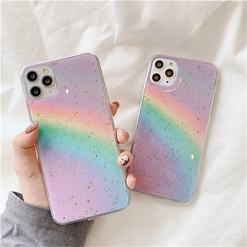 Rainbow gradient iPhone case with striped design on a phone