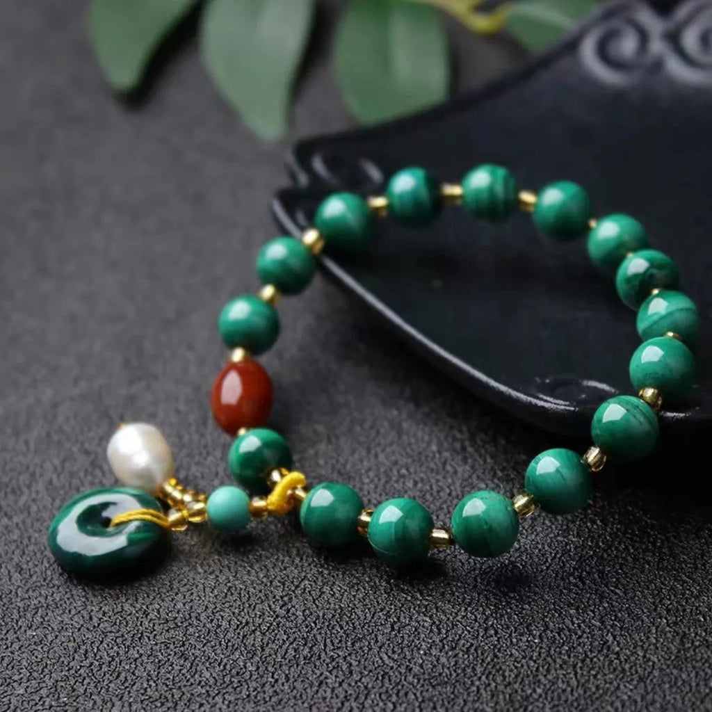 Natural green malachite and red agate barrel bead bracelet with approximately 7-8mm beads