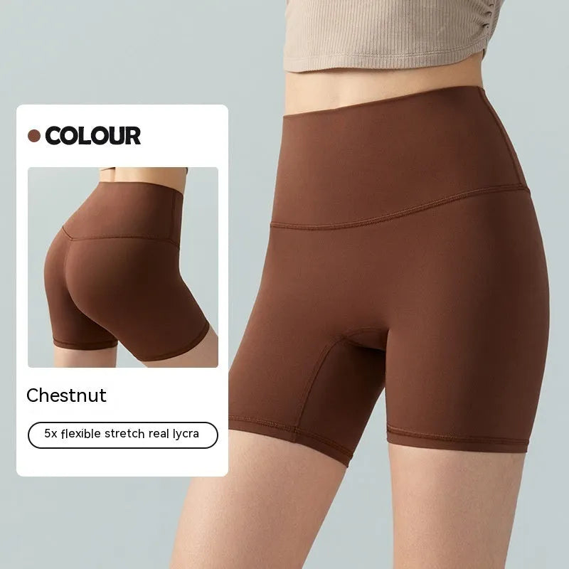 Women's high waist leaf green Lycra yoga shorts for fitness and cycling.