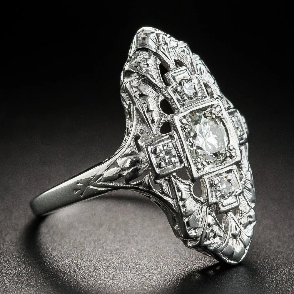 Hollow out geometric silver colour ring with diamond studs on a copper base