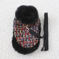 Classic style dog cloak attached to a cloth chest strap harness with an integrated hand holding rope leash.