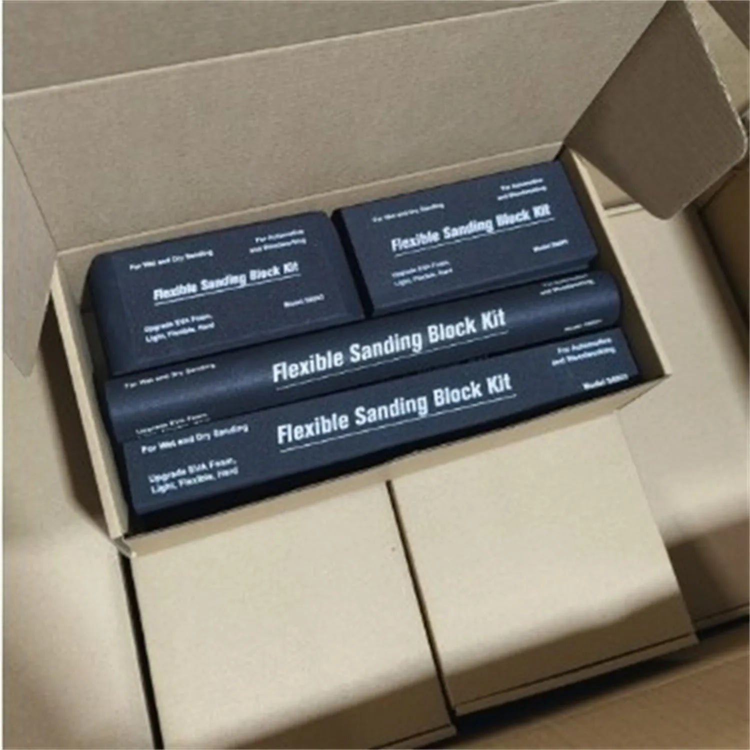 Set of seven black frosted EVA display blocks with metal construction for photography and staging.