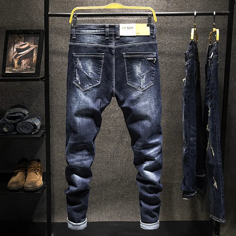 Men's slim-fitting skinny jeans in dark blue cotton denim with micro elasticity.