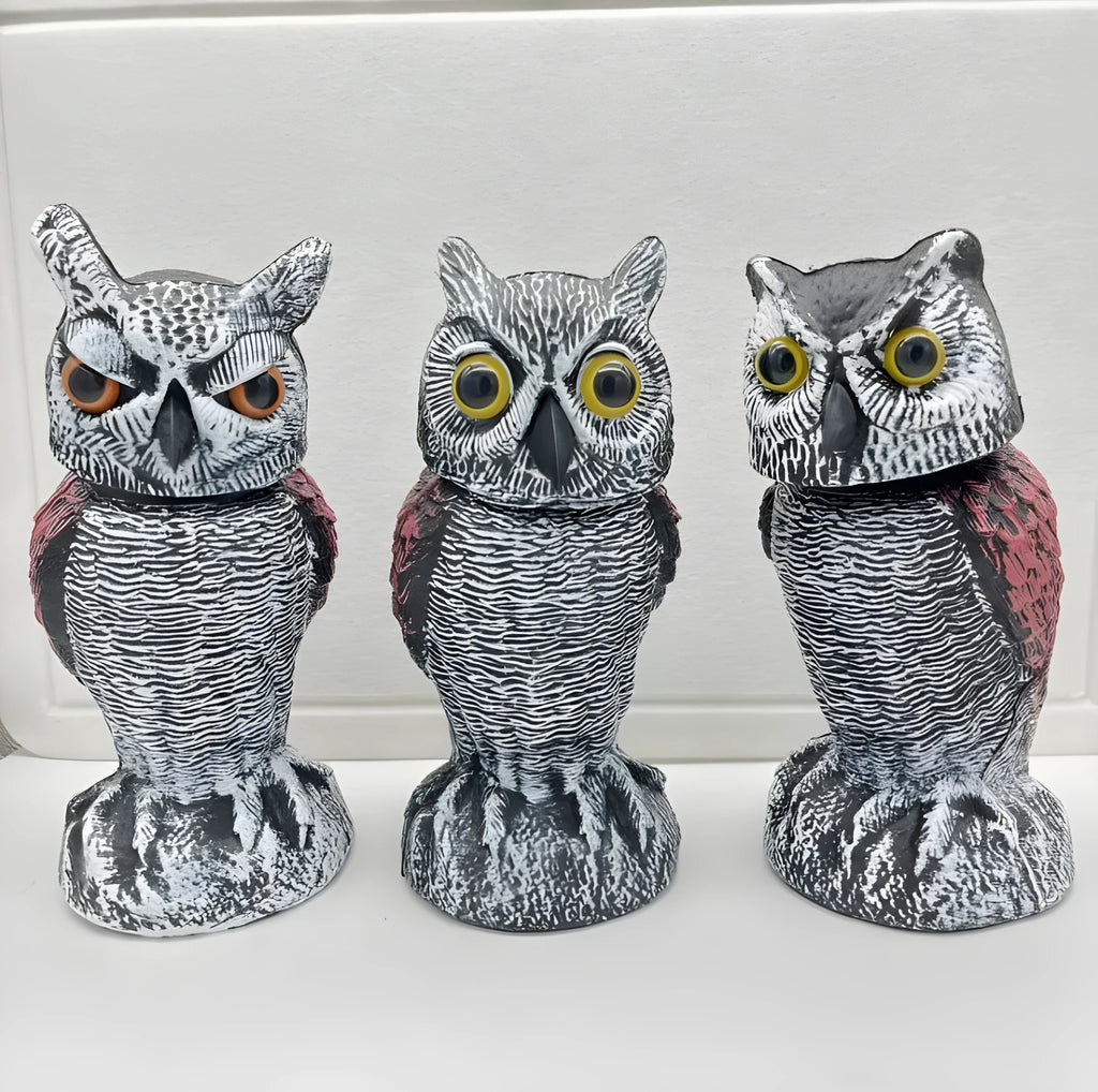 Artificial owl bird scarer decoy with movable head, made from black PE plastic for outdoor use.