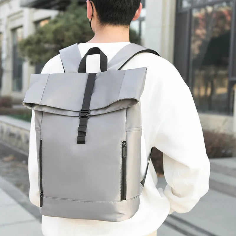 Men's grey nylon business leisure backpack with breathable back panel and zipped compartments