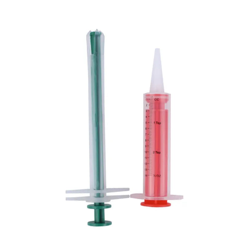 Two pet pill shooter syringes with soft silicone tips for administering tablets to cats and dogs