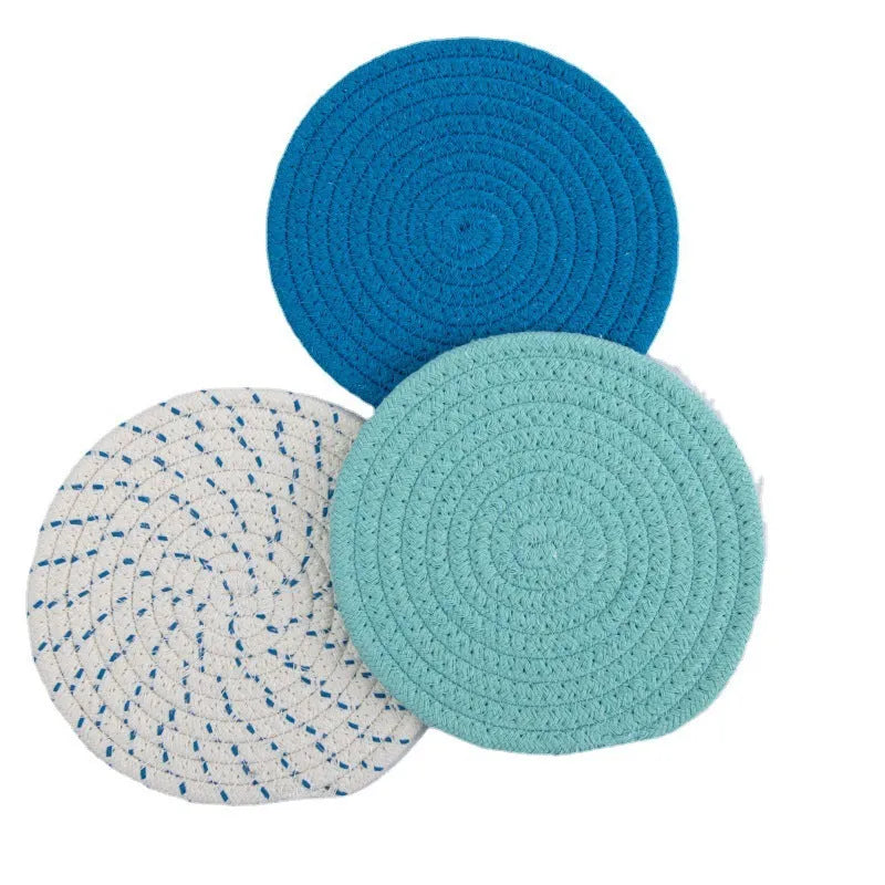 Set of three round cotton cord coasters in blue colour, each measuring 18cm diameter